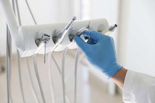 Professional Tooth Extraction technician working in South Cleveland, TN